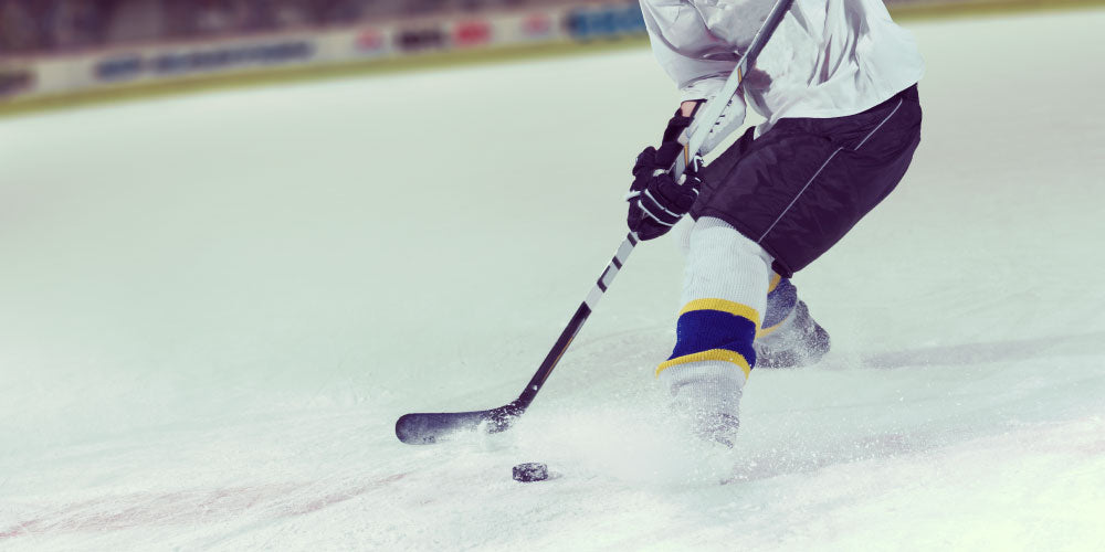 Image of a hockey player on ice.